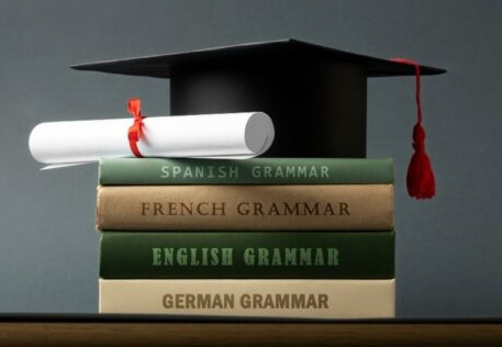 mortarboard diploma grammar books 600x400